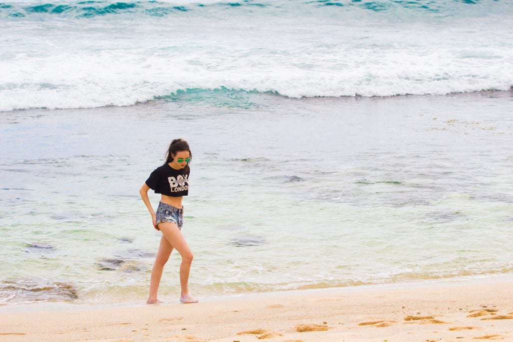 Ella McKendrick on Takamaka beach on Mahe island in Seychelles
