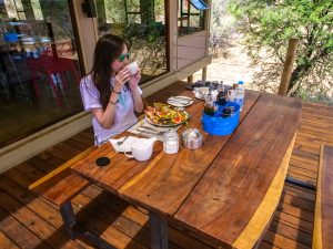 Ella having lunch at N/a’an ku sê (Naankuse) Wildlife Sanctuary in Namibia, Africa