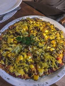 Biltong pizza in Onguma Reserve near Etosha National Park in Namibia, Africa