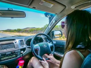 Ella driving from Etosha National Park to Damaraland in Namibia, Africa