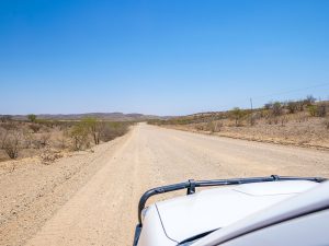 Driving through desert and savannah in Damaraland in Namibia, Africa