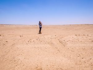 Ella in Namib Desert with DJI drone on Skeleton Coast, Namibia Africa