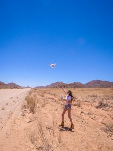 Ella with drone in Namib Desert in Namibia, Africa