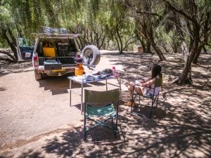 Ella with Toyota Hilux 4x4 self-drive with rooftop tent in Namib-Naukluft Mountain Zebra Park campsite, Namibia, Africa