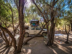 Ella with Toyota Hilux 4x4 self-drive with rooftop tent in Namib-Naukluft Mountain Zebra Park campsite, Namibia, Africa