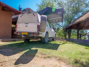 Toyota Hilux 4x4 with rooftop tent at Lake Oanob Resort, Rehoboth, Namibia, Africa