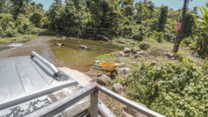 Journey through the rainforest, over rivers, to Banana Lama Eco-Villas in Rosalie, Dominica