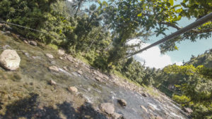Zipline over rivers in the rainforest to Banana Lama Eco-Villas in Rosalie, Dominica