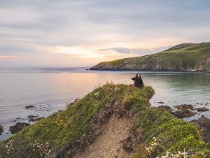 Ella McKendrick on a Cliff in Church Bay in Anglesey, Wales