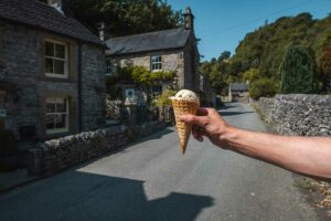 Holding an ice cream in Milldale village, Raven’s Tor in Dovedale Valley, Peak District