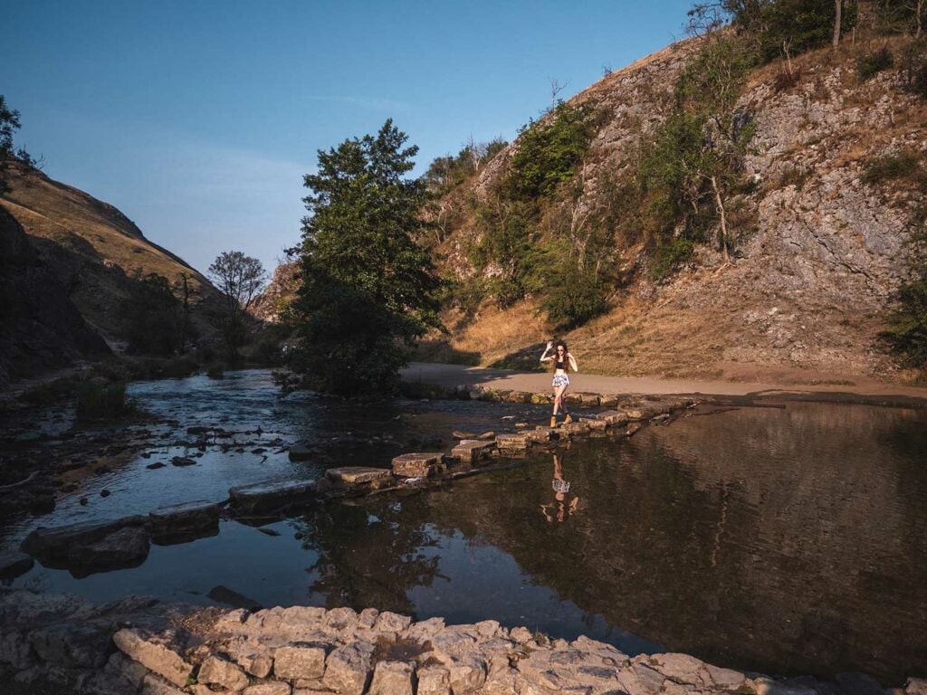 Ella Crossing the Dovedale Stepping Stones in the Peak District
