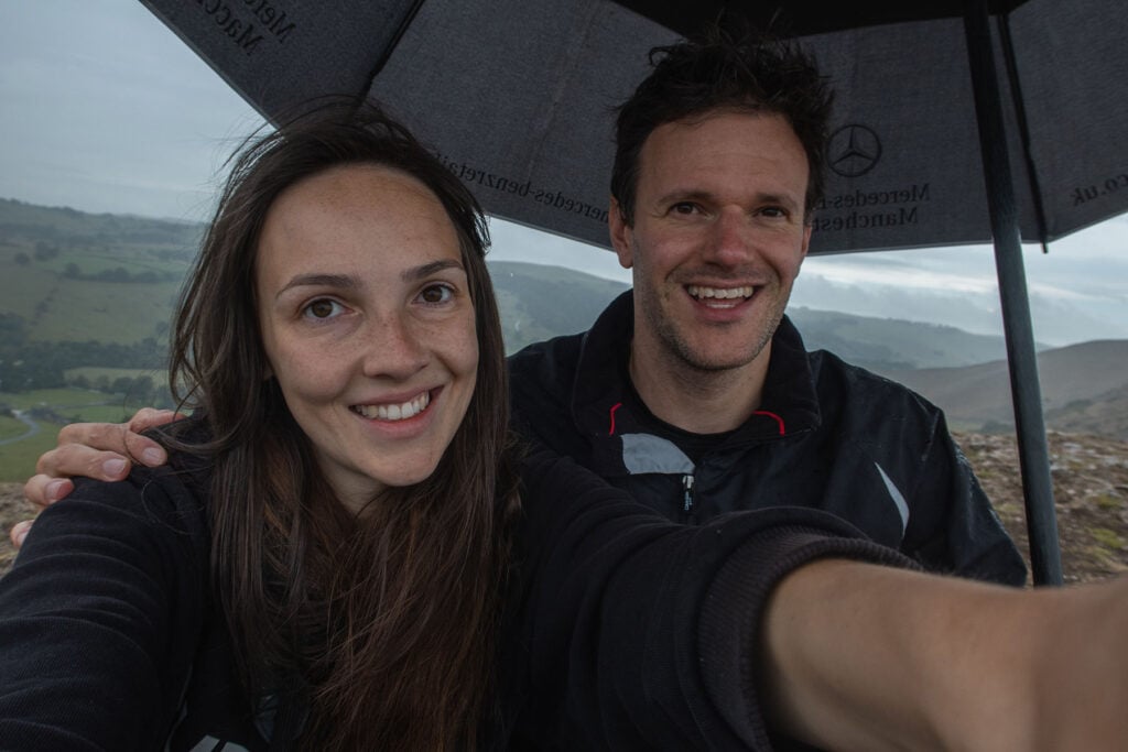 Sheltering under an umbrella on the summit on Thorpe Cloud