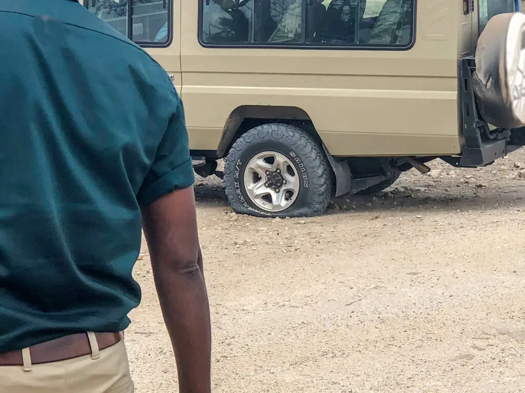 Safari truck broken down with flat tyre
