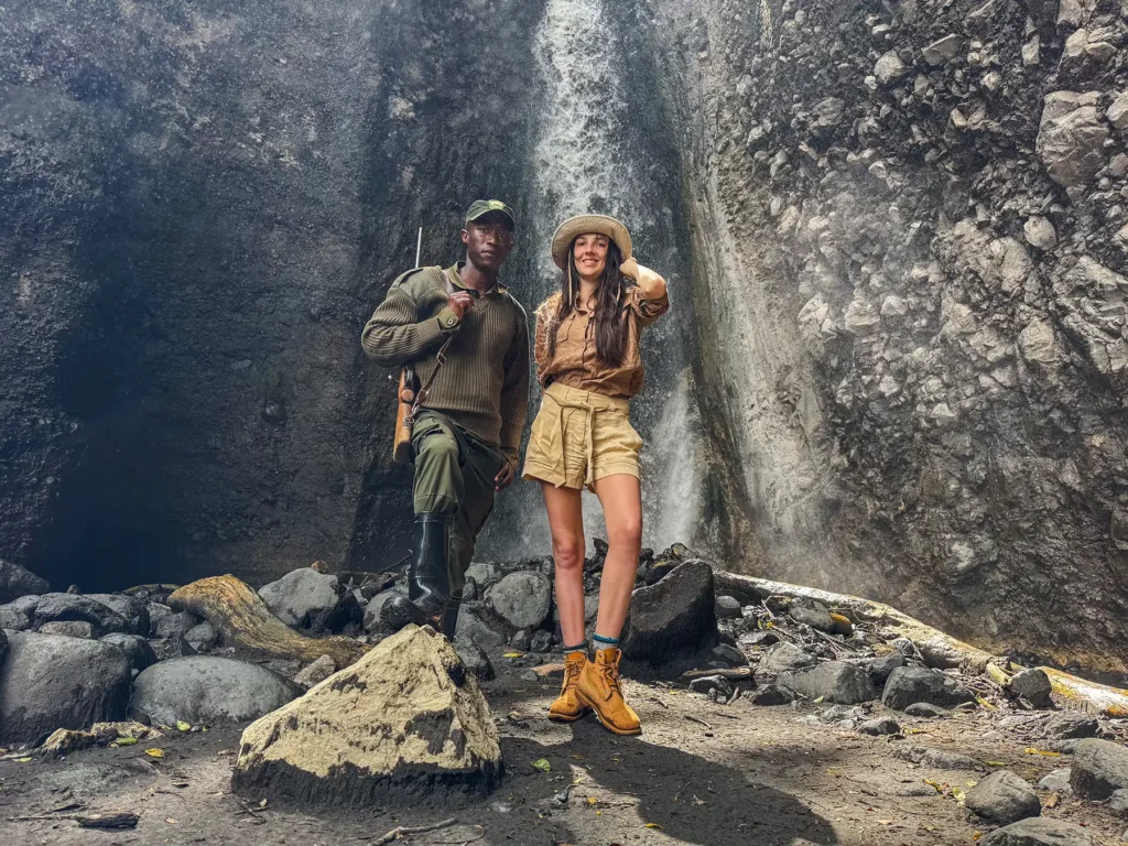 Ella Mckendrick with guide at Tululusia waterfalls in Arusha National Park