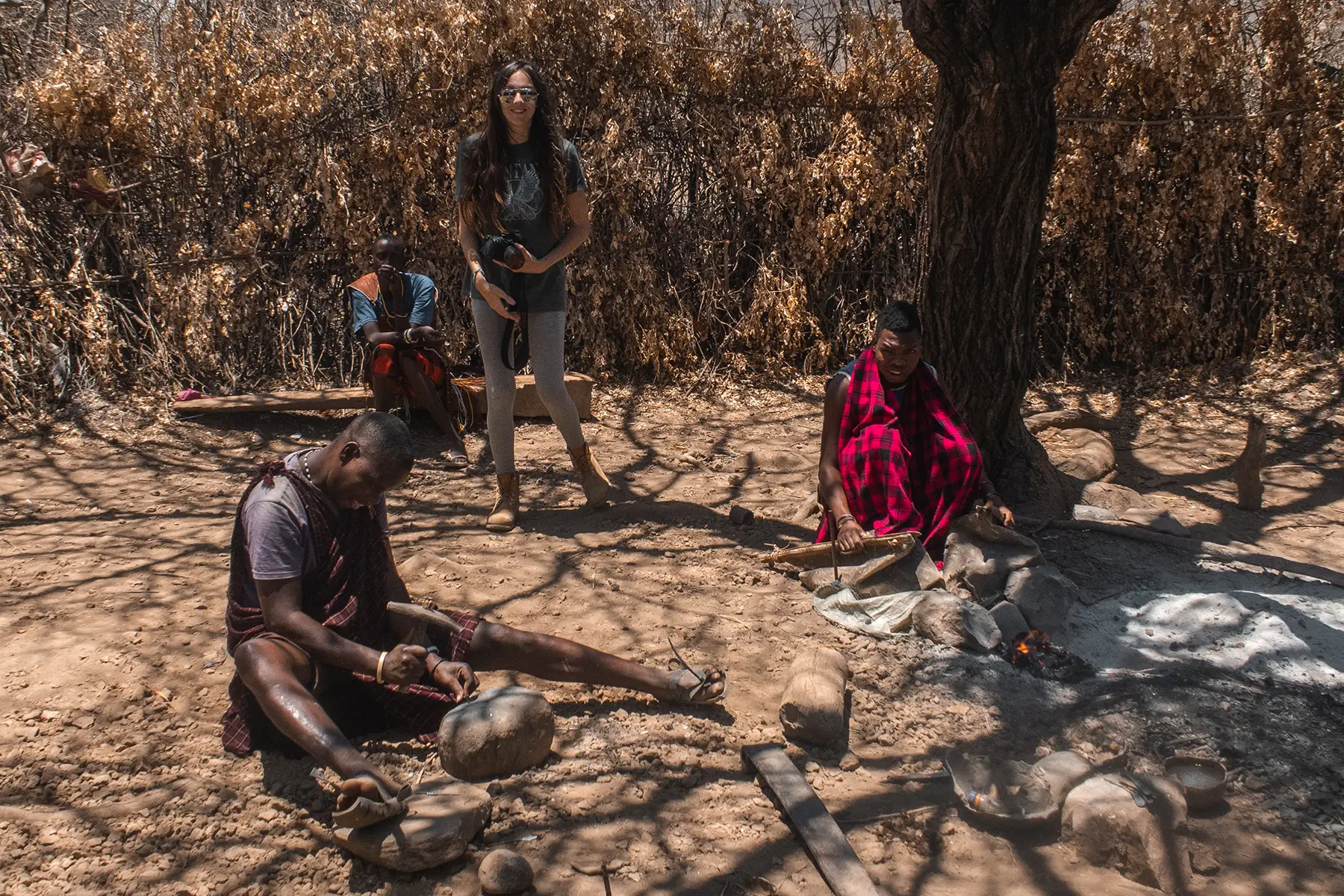 Datoga tribe Tanzania melting metal and making arrow heads by hand