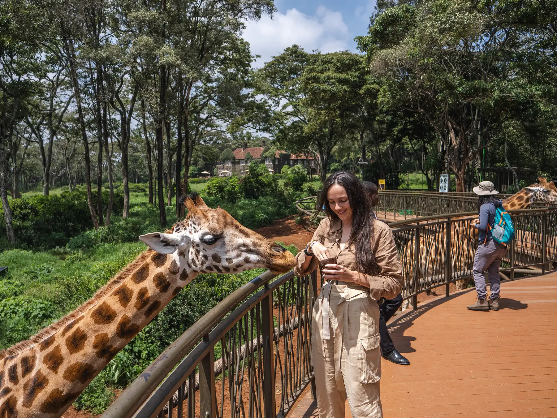 Ella McKendrick feeding a giraffe at the Giraffe Centre in Nairobi