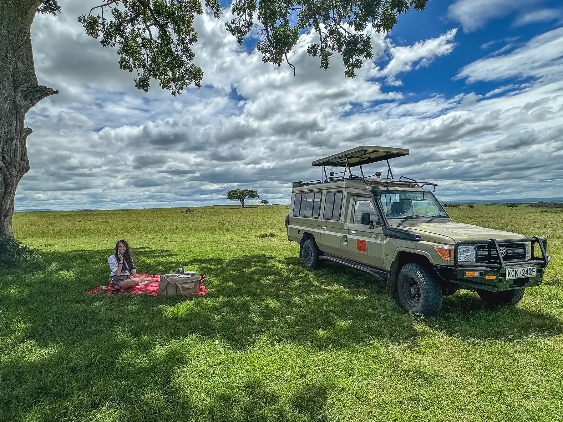 Me having a picnic lunch on safari in the Masai Mara, Kenya