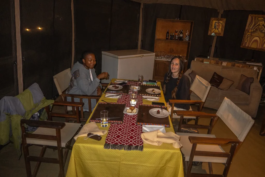Ella Mckendrick eating lunch in a tented camp in the serengeti