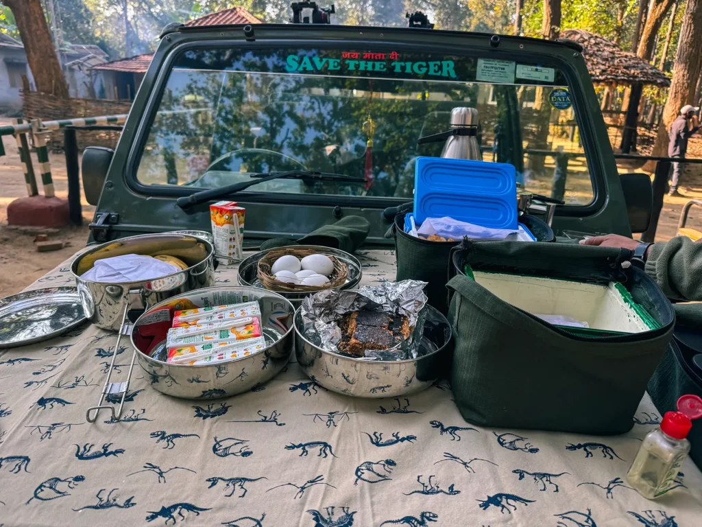 Safari truck with lunch laid out on the bonnet
