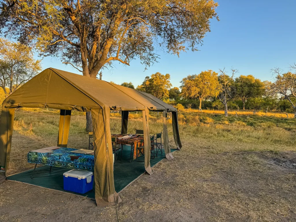 Mobile dining tent setup in Khwai Community Area, Botswana.
