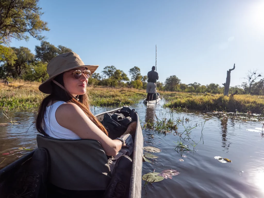 Ella McKendrick on Mokoro (traditional canoe) Khwai Community Area, Botswana.