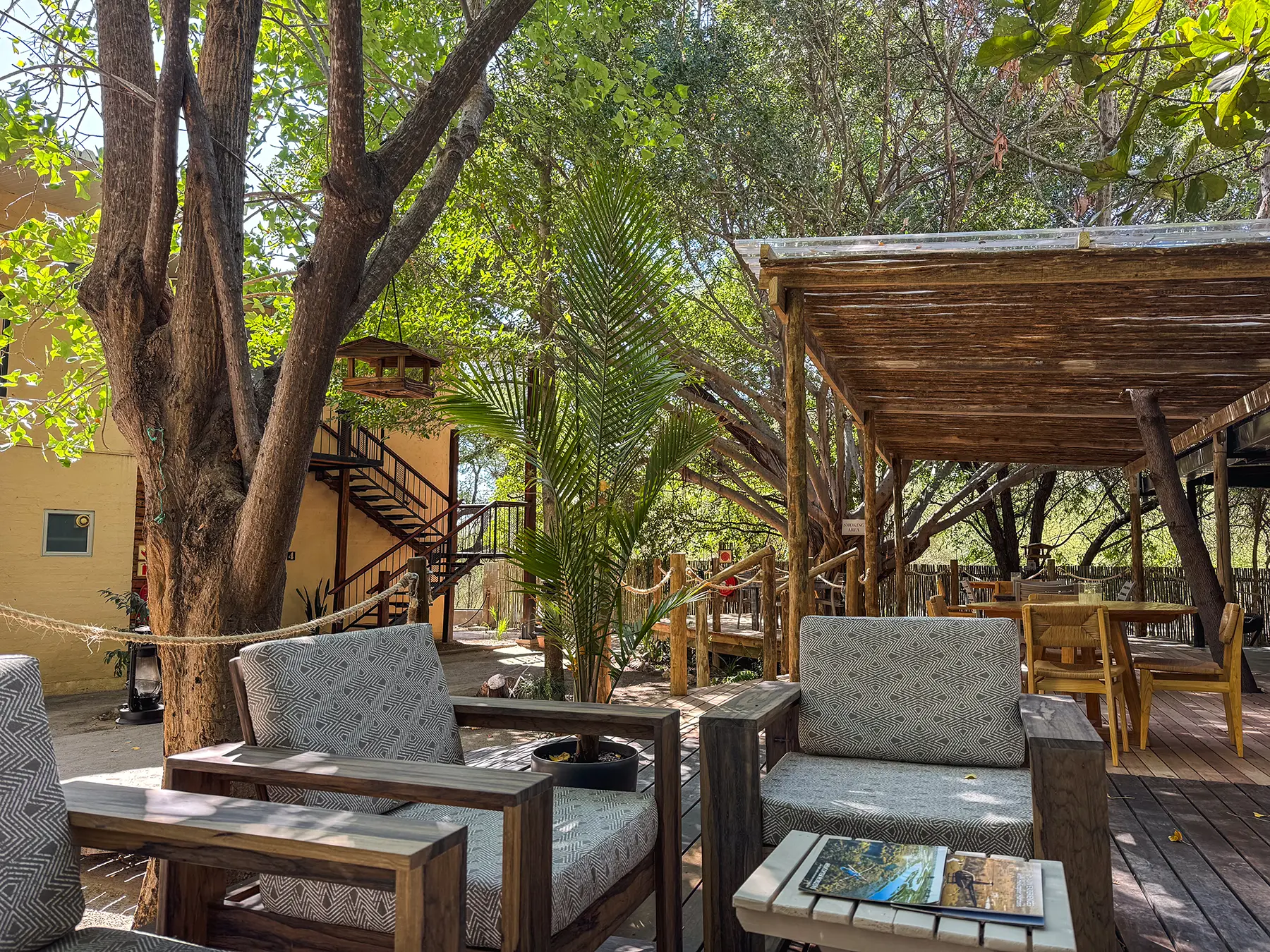 Communal seating area on the deck at The Waterfront, Maun, Botswana