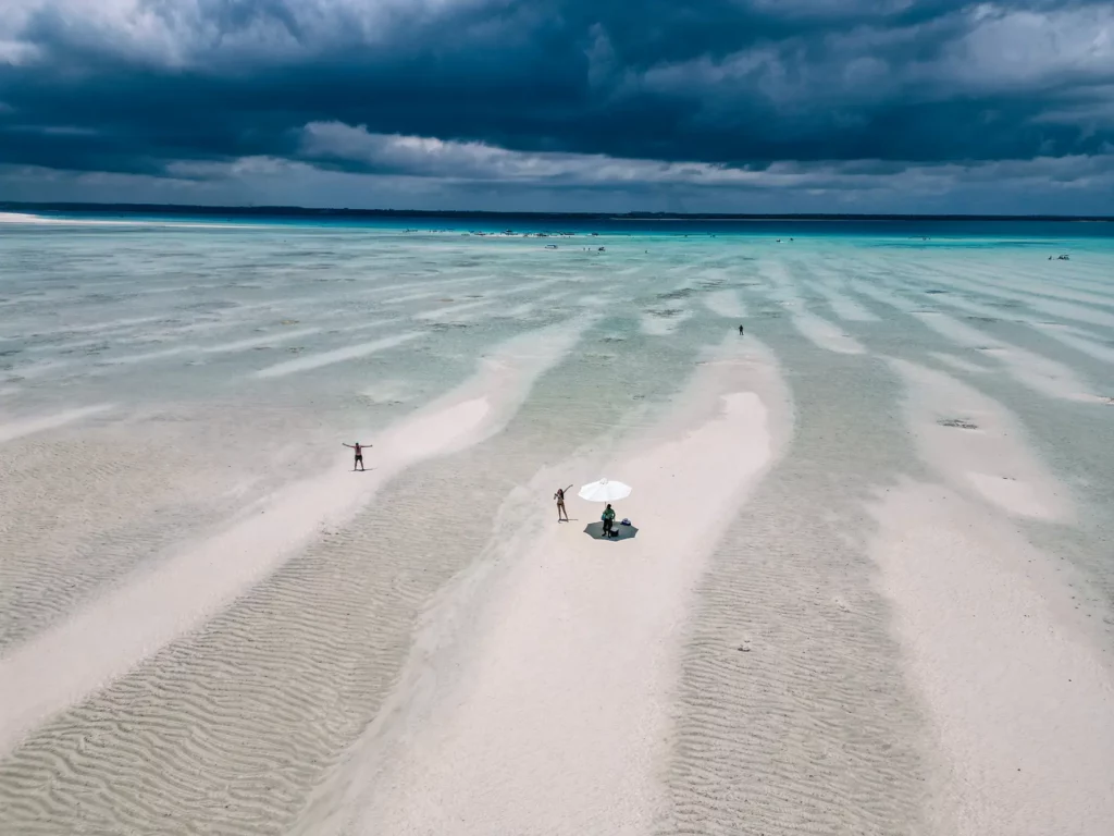 Ella McKendrick having drinks on a sandbank in Zanzibar
