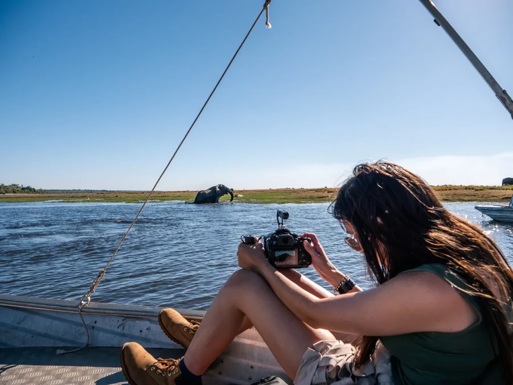Ella Mckendrick photographing an elephant on a Chobe Riverfront safari