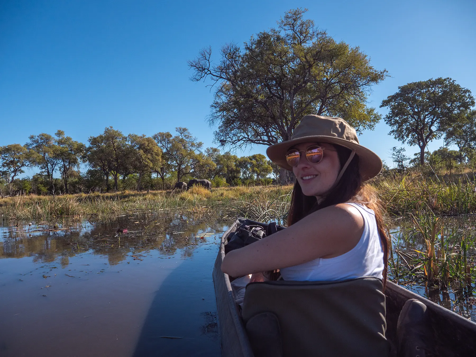 Ella McKendrick on Mokoro (traditional canoe) Khwai Community Area, Botswana