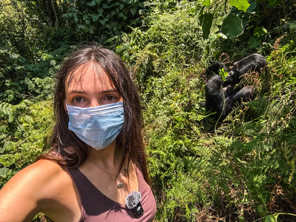Ella McKendrick photographing gorillas at Bwindi Impenetrable Forest, Uganda