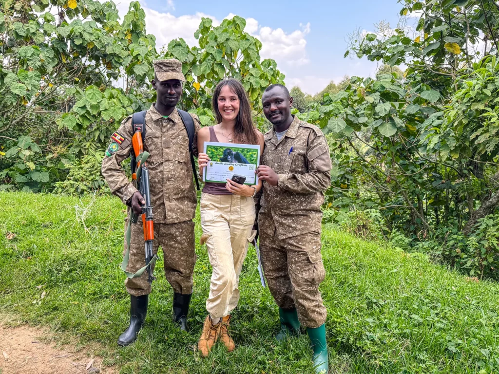 Ella McKendrick receiving a gorillas tracking certificate in Bwindi Impenetrable Forest, Uganda