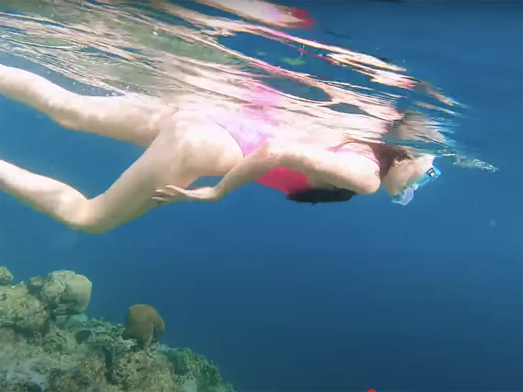 Ella McKendrick snorkelling over a reef
