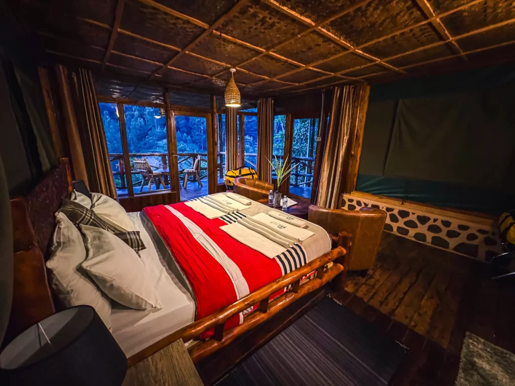 My room at Rushaga Gorilla Lodge with views across Bwindi Impenetrable Forest, Uganda 