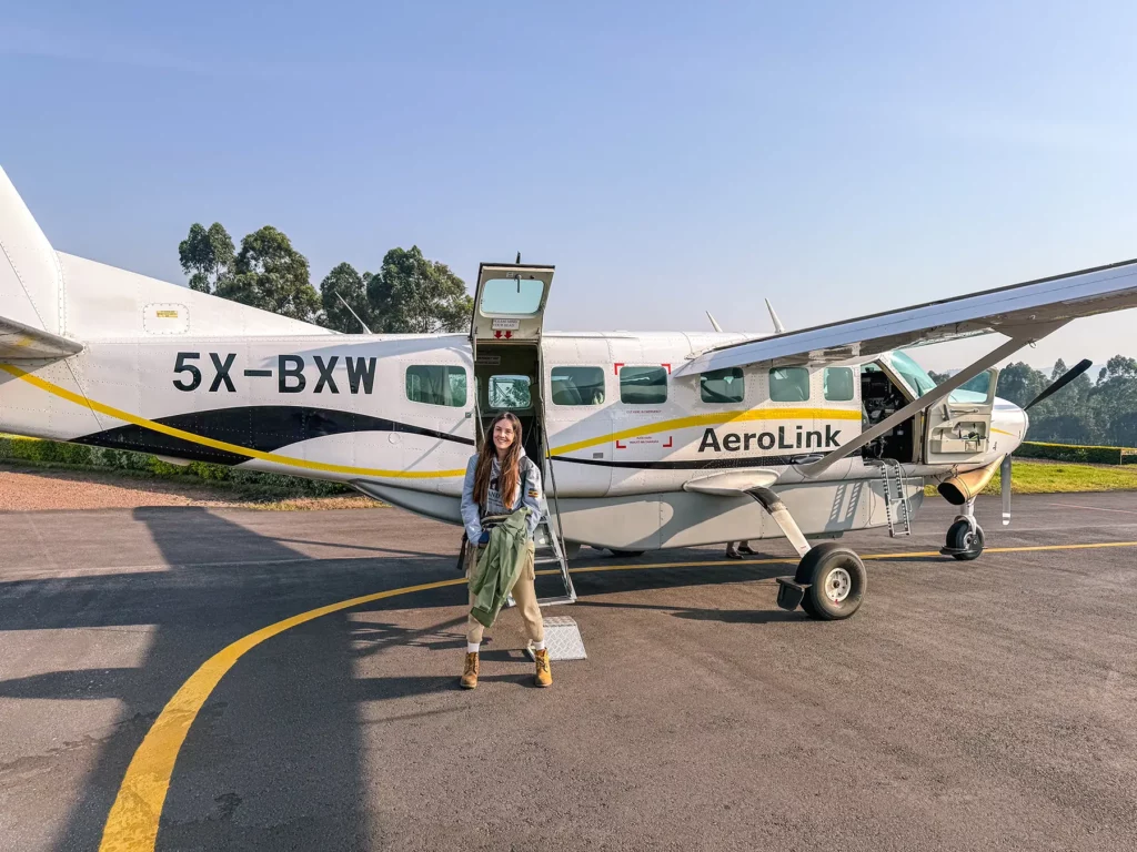 Ella McKendrick boarding a safari plane at Kisoro Airport after gorilla tracking in Uganda