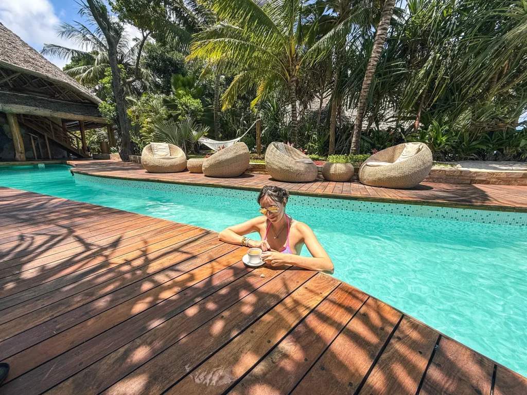 Ella McKendrick having tea in the pool in a luxury hotel in Zanzibar