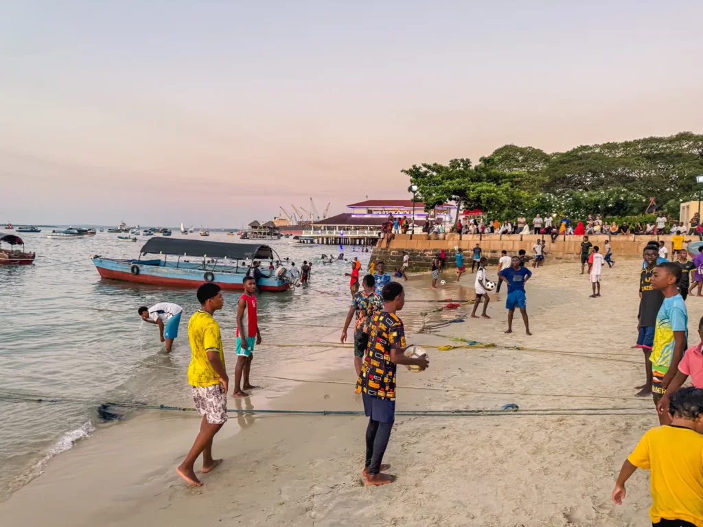 Locals playing on the beach in Stone Town, Zanzibar