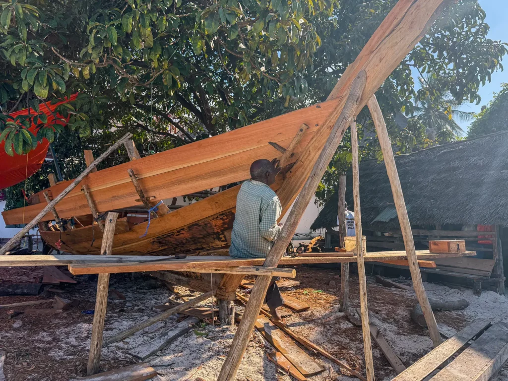 Local joiner making a boat on Nungwi Beach, Zanzibar