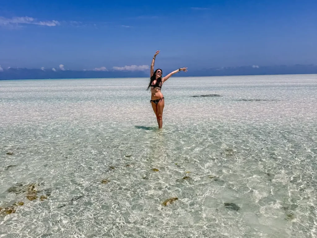 Ella McKendrick in the crystal clear waters of Zanzibar