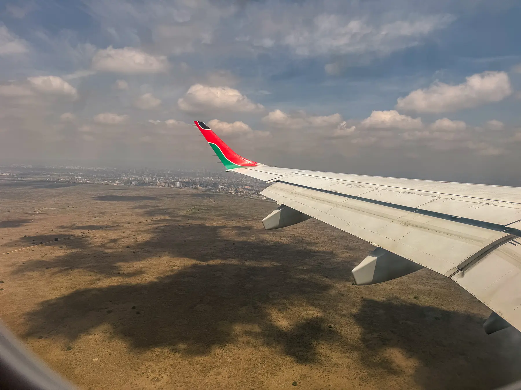 View from a plane window flying to a safari destination
