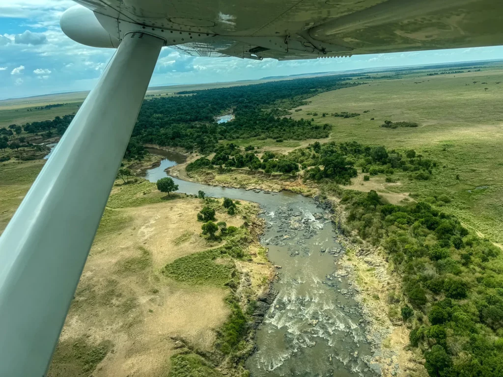 Flying over the Mara River in a Cessna Grand Caravan plane