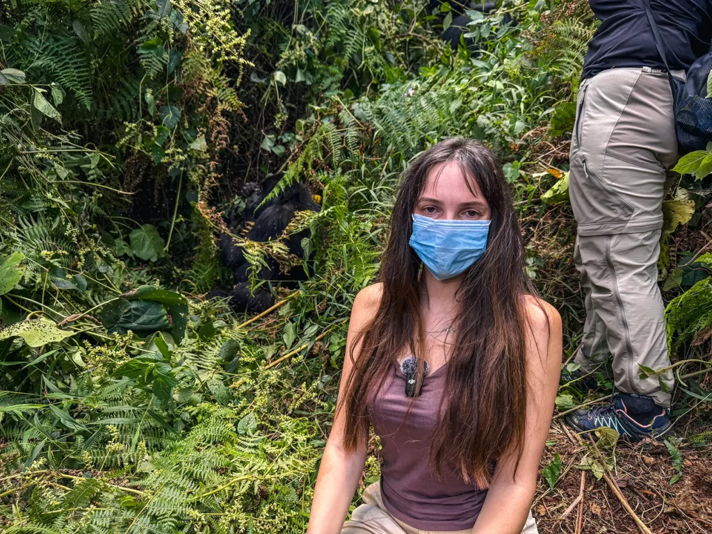 Ella McKendrick in front of gorillas at Bwindi Impenetrable Forest, Uganda