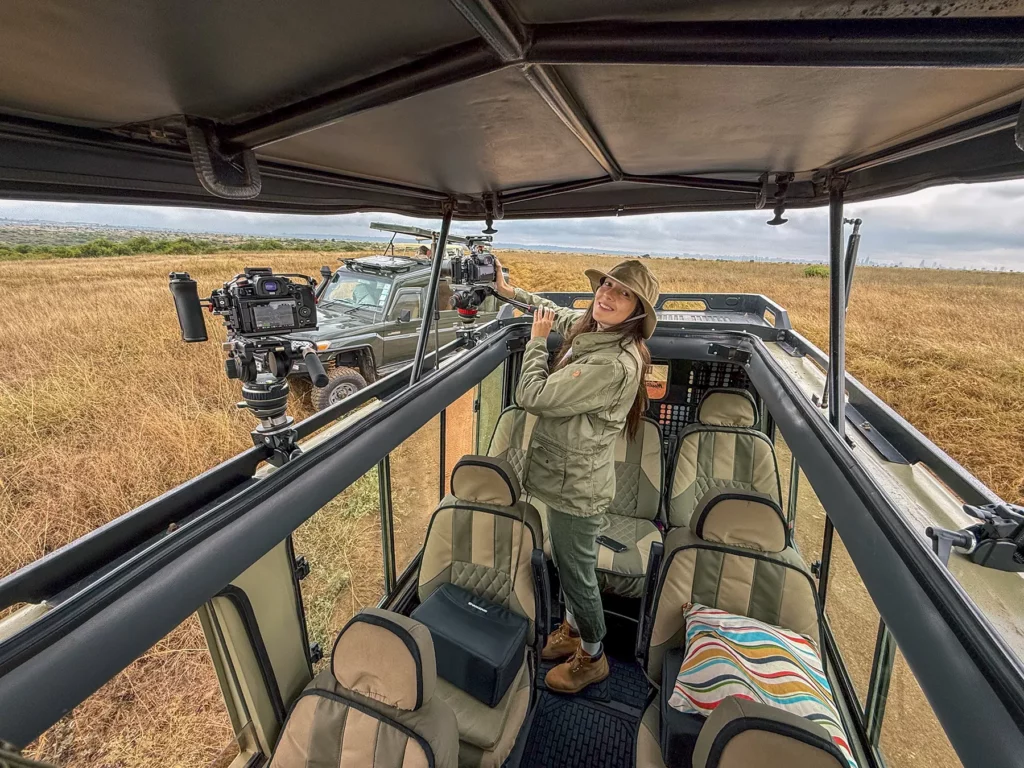 Ella McKendrick photographing wildlife in Nairobi National Park, Kenya