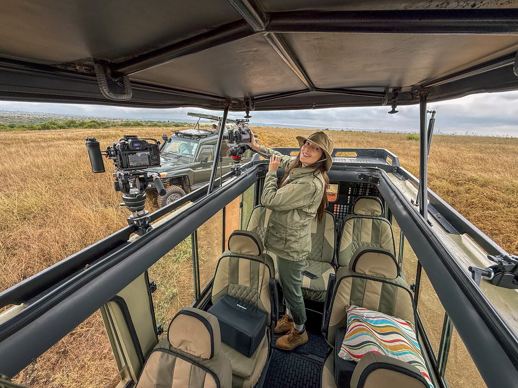 Ella McKendrick photographing wildlife in Nairobi National Park, Kenya