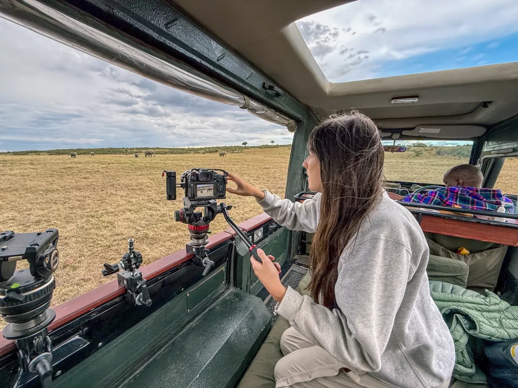 Ella McKendrick in safari truck in Maasai Mara, Kenya