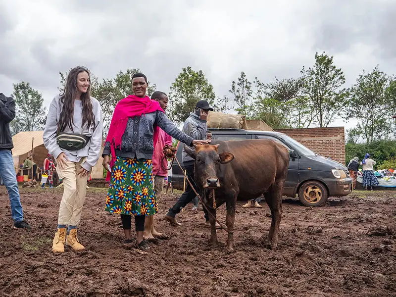 Conservation cow project - family receiving cow - ella mckendrick
