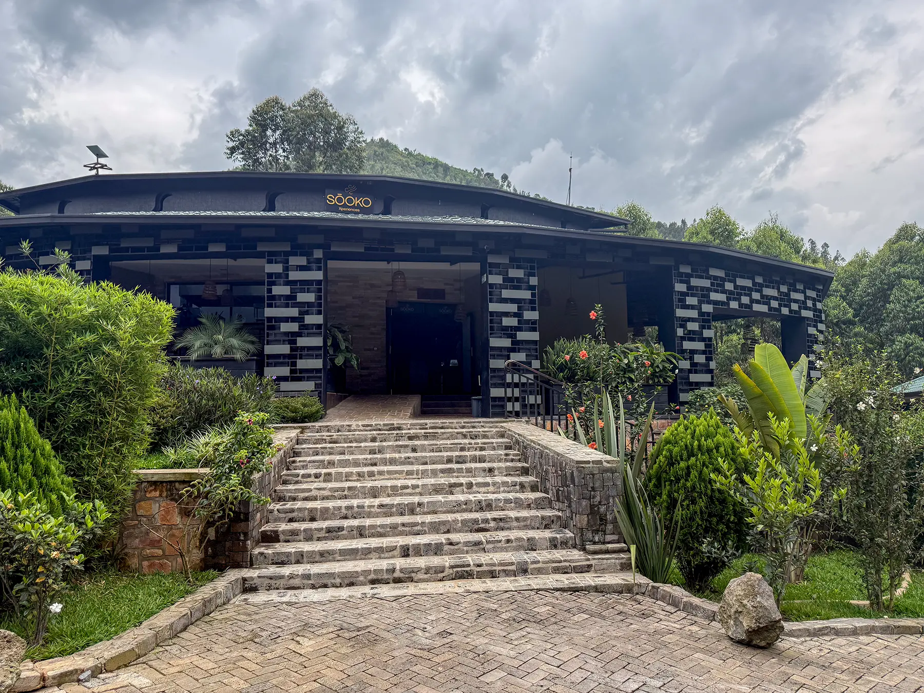Stone steps leading up to Sooko lodge entrance at Musanze in Volcanoes National Park, Rwanda